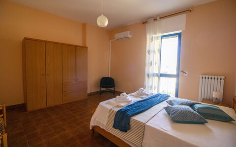Elena'S House in Otranto: Furniture, Floor, Flooring, Interior Design, Bedroom, Bed, Wood, Bed Sheet, Ceiling, Room