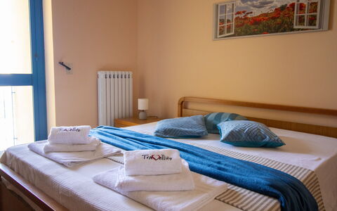Elena'S House in Otranto: Wood, Furniture, Chair, Wood Stain, Hardwood, Bedroom, Hotel, Bed, Bed Frame