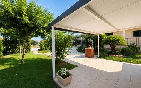 Villa Andrea: Shade, Garden, Outdoor Structure, Outdoor Furniture, Flowerpot, Pergola, Awning, Patio, Houseplant, Yard