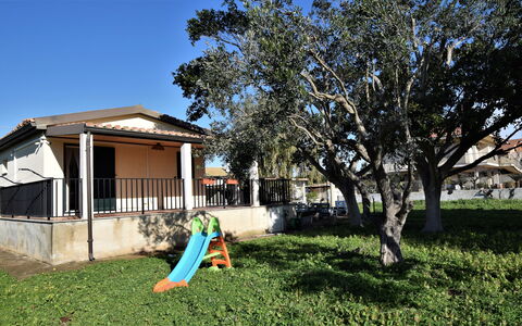 Villa Andrea: Tree, Shade, Estate, Lawn, Yard, Landscaping, Backyard, Outdoor Structure, Hacienda, Fence