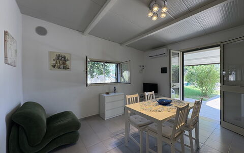 Villa Andrea: Flooring, Floor, Interior Design, Ceiling, Furniture, Room, Home, Door, Light Fixture, Living Room