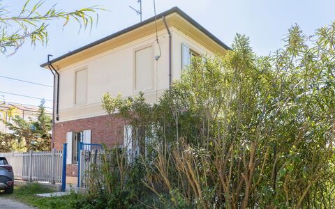 Casale Oleandro Marino: Building, Residential Area, House, Home, Shrub, Human Settlement, Suburb, Estate, Driveway, Overhead Power Line