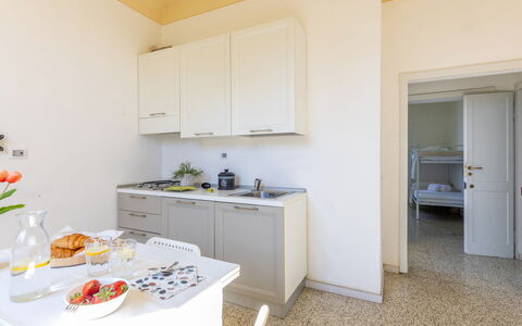 Casale Oleandro Marino: Flooring, Interior Design, Floor, Room, Ceiling, Apartment, Cabinetry, Countertop, Molding, Kitchen Appliance