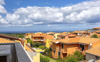 Marina di Sorso 5: Building, Residential Area, Roof, House, Architecture, Neighbourhood, Home, Town, Urban Design, Apartment