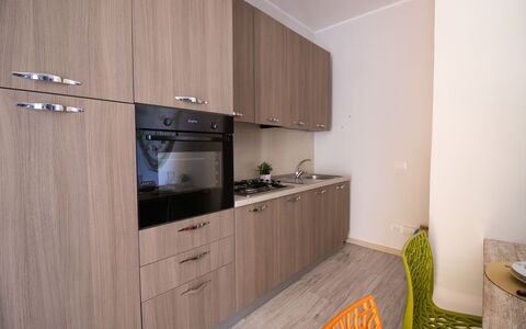 Mediterranea'S House Otranto: Major Appliance, Wood, Flooring, Interior Design, Kitchen Appliance, Kitchen, Cabinetry, Floor, Countertop, Room