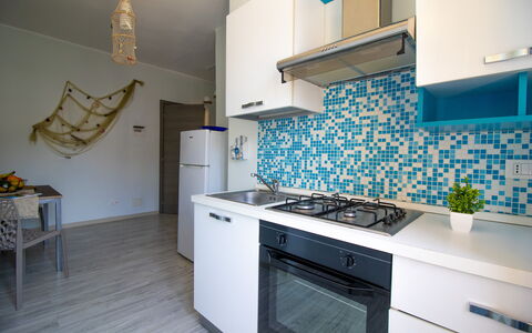 Mediterranea'S House Otranto: Wood, Flooring, Interior Design, Floor, Apartment, Furniture, Room, Kitchen, Wood Stain, Countertop