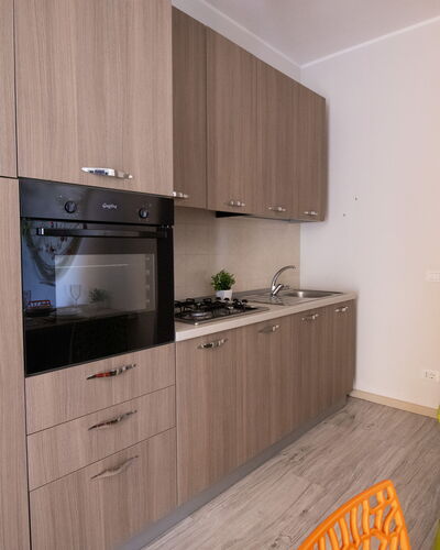 Mediterranea'S House Otranto: Major Appliance, Wood, Flooring, Interior Design, Kitchen Appliance, Kitchen, Cabinetry, Floor, Countertop, Room