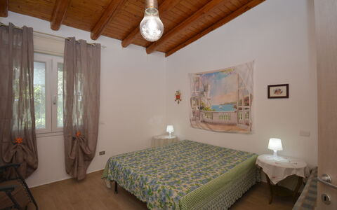 Villa Mameli: Furniture, Interior Design, Bed, Bedroom, Wall, Floor, Flooring, Bed Sheet, Wood, Room