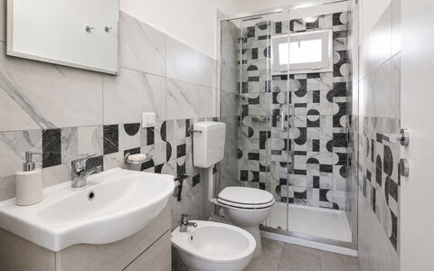 Villa Giugiola: Flooring, Floor, Plumbing Fixture, Interior Design, Bathroom, Toilet, Sink, Plumbing, Tile, Tap