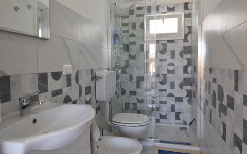 Villa Giugiola: Flooring, Floor, Plumbing Fixture, Interior Design, Bathroom, Bathroom Sink, Sink, Plumbing, Tap, Tile