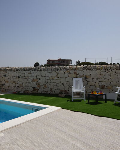 Villa Giugiola: Swimming Pool, Outdoor Furniture, Resort, Composite Material, Shade, Estate, Leisure, Sunlounger, Yard, Eco Hotel
