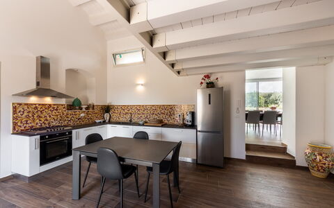 Villa Meti: Furniture, Interior Design, Flooring, Floor, Wood, Ceiling, Kitchen, Room, Lighting, Countertop