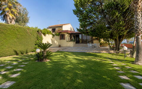 Villa Billona: Tree, Garden, Landscape, Shrub, Architecture, Residential Area, House, Lawn, Land Lot