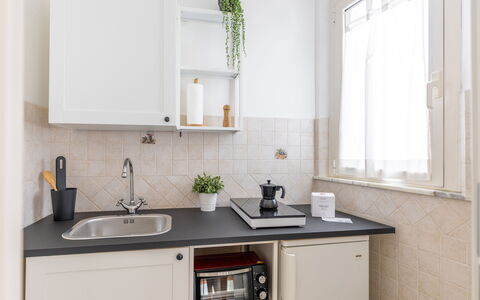 Fano Mare: Kitchen, Countertop, Kitchen Appliance, Cabinetry, Interior Design, Major Appliance, Furniture, Home Appliance, Plumbing Fixture, Tap