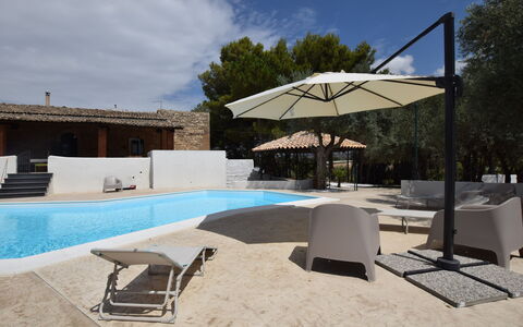 Villa Chiaramonte Gulfi: Shade, Swimming Pool, Outdoor Furniture, Umbrella, Concrete, Sunlounger, Resort, Design, Eco Hotel, Outdoor Structure
