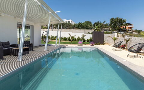 A Casa di Chica: Swimming Pool, Outdoor Furniture, Resort, Composite Material, Shade, Eco Hotel, Landscaping, Estate, Sunlounger, Chair