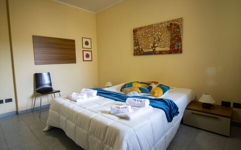 Nicoletta'S House in Otranto: Furniture, Interior Design, Wall, Bed, Flooring, Floor, Wood, Bedroom, Room, Bed Sheet