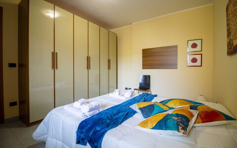 Nicoletta'S House in Otranto: Interior Design, Bed, Bedroom, Flooring, Floor, Wood, Furniture, Bed Sheet, Room, Ceiling