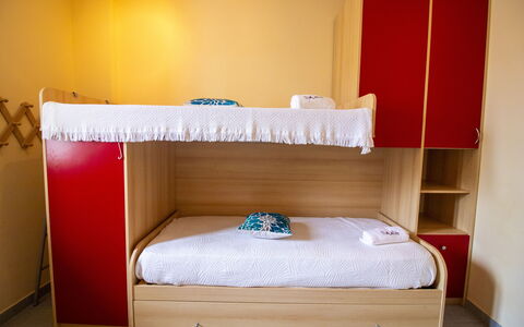 Nicoletta'S House in Otranto: Furniture, Wood, Floor, Bedroom, Flooring, Textile, Interior Design, Bed, Room, Bed Sheet