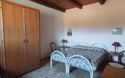 Baita Vignola: Furniture, Floor, Flooring, Bed, Bedroom, Interior Design, Wood, Bed Sheet, Ceiling, Room