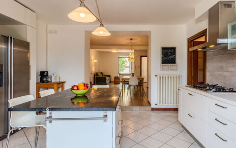 Legnone: Furniture, Interior Design, Flooring, Countertop, Kitchen, Floor, Ceiling, Wood, Room, Light Fixture