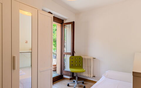 Legnone: Furniture, Interior Design, Floor, Flooring, Wood, Bed, Bedroom, Room, Ceiling, Apartment