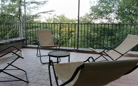 House in the Woods, Pool and Relax in Umbria: Furniture, Chair, Outdoor Furniture, Outdoor Table, Iron, Shade, Metal, Folding Chair, Deck, Balcony