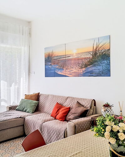 Bemi' Al Mare: Furniture, Interior Design, Couch, Floor, Flooring, Wall, Room, Living Room, Wood, Apartment