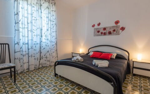 Villa Sole Mare: Floor, Flooring, Bedroom, Interior Design, Furniture, Bed, Bed Sheet, Room, Linens, Bedding