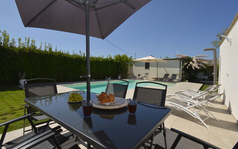 Villa Benvenuti al Sud: Furniture, Outdoor Furniture, Swimming Pool, Chair, Umbrella, Outdoor Table, Table, Shade, Kitchen & Dining Room Table, Patio