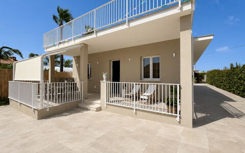 Villa Benvenuti al Sud: Residential Area, Home, Porch, Composite Material, Balcony, Shade, Estate, Concrete, Fence, Deck