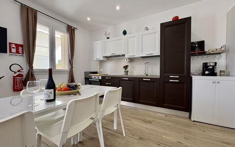 Villa Benvenuti al Sud: Furniture, Flooring, Interior Design, Kitchen, Wood, Floor, Wood Flooring, Countertop, Cabinetry, Kitchen Appliance