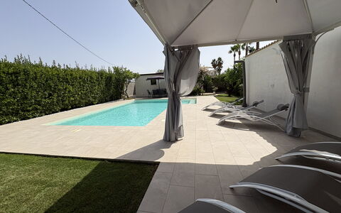 Villa Benvenuti al Sud: Swimming Pool, Shade, Composite Material, Resort, Leisure, Outdoor Furniture, Eco Hotel, Landscaping, Garden, Outdoor Structure