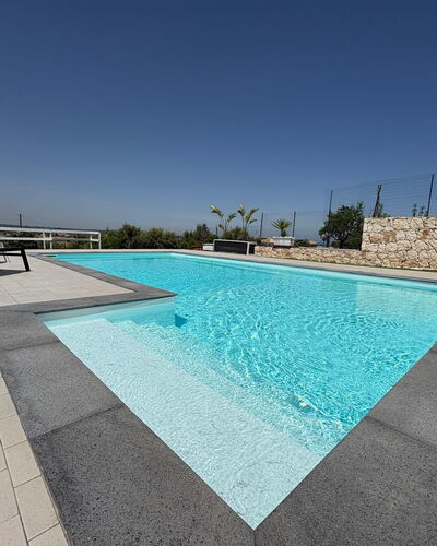 Rari House: Swimming Pool, Composite Material, Floor, Concrete, Tile, Shade, Flagstone, Design, Resort