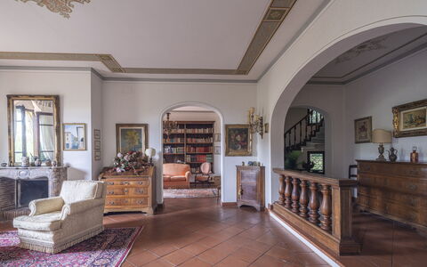 Villa Golly: Furniture, Interior Design, Flooring, Floor, Ceiling, Room, Chair, Living Room, Molding, Picture Frame