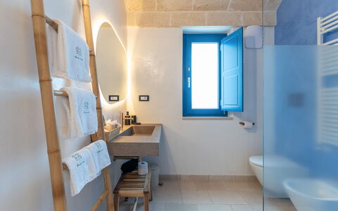 Tenuta Emma: Blue, Wall, Flooring, Floor, Composite Material, Plumbing Fixture, Ceiling, Light Fixture, Tile, Bathroom