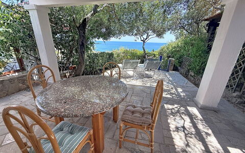 Porto Luna 1: Furniture, Outdoor Furniture, Chair, Table, Outdoor Table, Kitchen & Dining Room Table, Sea, Shade, Resort, Coast