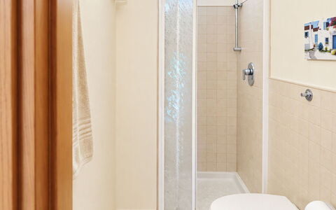 Coniglio Beach: Plumbing Fixture, Bathroom, Wall, Flooring, Floor, Interior Design, Door, Plumbing, Home, Shower