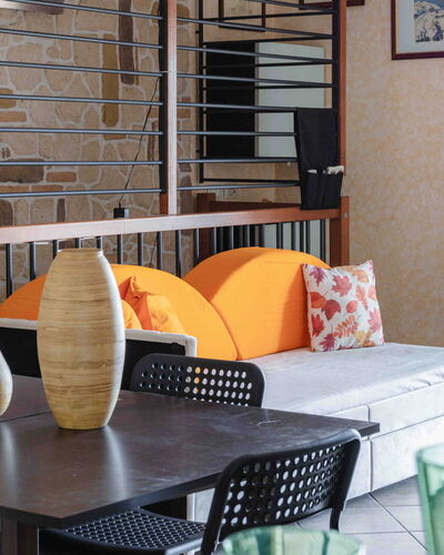 Casa Dolceconero: Furniture, Interior Design, Wall, Chair, Table, Flooring, Floor, Lighting, Living Room, Orange