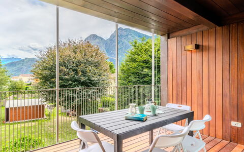 Zani: Hardwood, Deck, Wood Stain, Wood Flooring, Porch, Chair, Plank, Outdoor Furniture, Kitchen & Dining Room Table, Eco Hotel