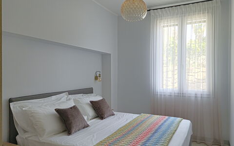 Oasis Villa Sanremo: Interior Design, Furniture, Wall, Bed, Floor, Bedroom, Flooring, Wood, Room, Ceiling
