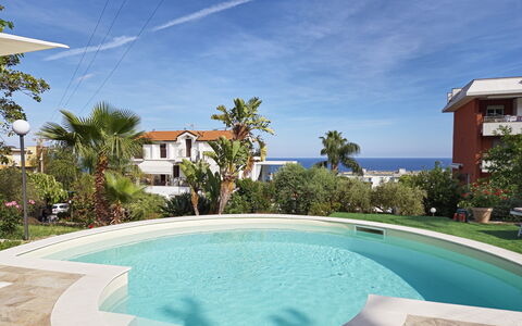 Oasis Villa Sanremo: Swimming Pool, Resort, Composite Material, Leisure, Eco Hotel, Outdoor Furniture, Shade, Hotel, Hacienda, Estate
