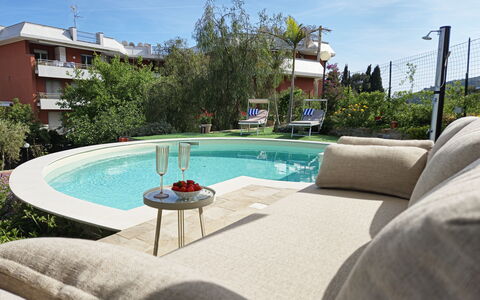 Oasis Villa Sanremo: Furniture, Swimming Pool, Outdoor Furniture, Chair, Resort, Umbrella, Eco Hotel, Shade, Backyard, Garden