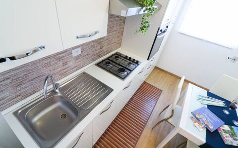 Casa Aurora a Otranto: Kitchen, Countertop, Kitchen Sink, Major Appliance, Kitchen Appliance, Flooring, Wood, Sink, Plumbing Fixture, Interior Design