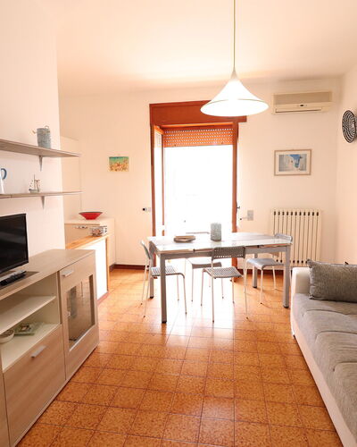 Margherita: Furniture, Interior Design, Flooring, Wood, Floor, Room, Living Room, Table, Couch, Picture Frame