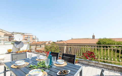 Attico del Corso: Apartment, Flowerpot, Balcony, Houseplant, Outdoor Furniture, Chair, Outdoor Table, Kitchen & Dining Room Table