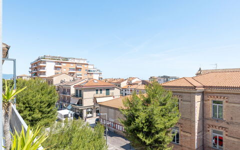 Attico del Corso: Sky, Building, Window, Residential Area, Urban Area, Apartment, Town, City, Neighbourhood, Home