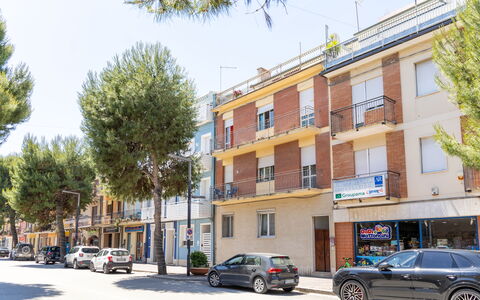 Attico del Corso: Building, Window, Road Surface, Town, Urban Area, Street, Road, Residential Area, Neighbourhood, Apartment