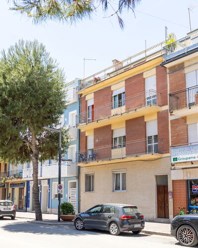 Attico del Corso: Building, Window, Road Surface, Town, Urban Area, Street, Road, Residential Area, Neighbourhood, Apartment