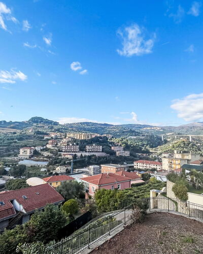 Ariel: Sky, Daytime, Residential Area, Roof, Urban Area, Town, City, Horizon, Neighbourhood, Landscape